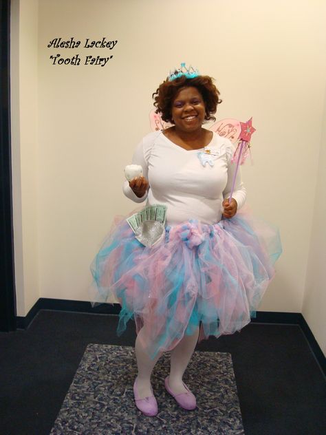 I made this tulle skirt by watching MikkisoXTRA's youtube videohttp://www.youtube.com/watch?v=hObklaNpLUc. I varied the colors in my skirt for my kid-friendly, work appropriate Halloween look. I added a few extra touches from the Dollar Tree and voila, instant tooth fairy! Dollar Tree Extras include * fairy wand * crown * play money * fairy wings * silver cosmetics pouch * plastic green bell pepper (spray painted white makes a pretty convincing "tooth") Diy Tooth Fairy Costume Women, Tooth Fairy Costume Scary, Tooth Fairy And Dentist Costume, Halloween Costume Toothfairy, Tooth Fairy Costume Diy, Tooth Fairy Costumes, Funny Tooth Fairy Meme, Play Money, Fairy Wands