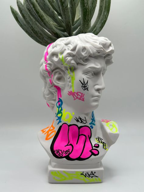 Graffiti Furniture, Statue Of David, Painted Concrete, Topic Ideas, Graff Art, Colorful Planters, Sculpture Head, Concrete Statues, 2023 Art