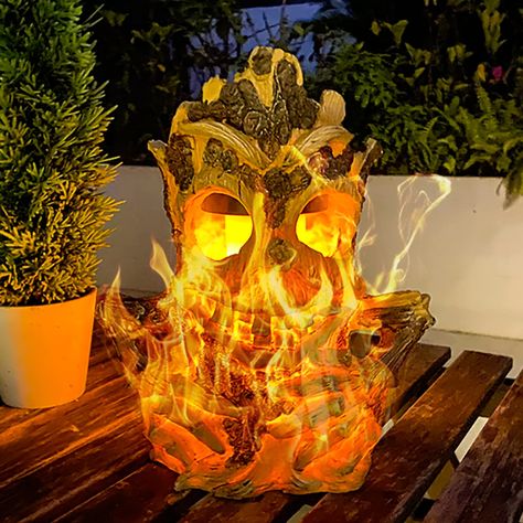 PRICES MAY VARY. UNIQUE DECORATIVE LIGHT： 2022 new creative design, this big solar monster tree stump light is made of resin, which is environmentally friendly and durable. This solar light will be an unique eye-catching decoration for your home, garden, patio, pathway, porch, table, yard. REALISTIC FLAME EFFECT： Super realistic & bright flickering flame in this solar tiki light is attractive, just like a real flame burning in this decorative light when you turn the light on. This statue light w Tiki Lights, Led Resin, Patio Pathway, Light Bulb Crafts, Solar Lanterns Outdoor, Solar Hanging Lanterns, Tiki Statues, Tiki Decor, Solar Lights Outdoor