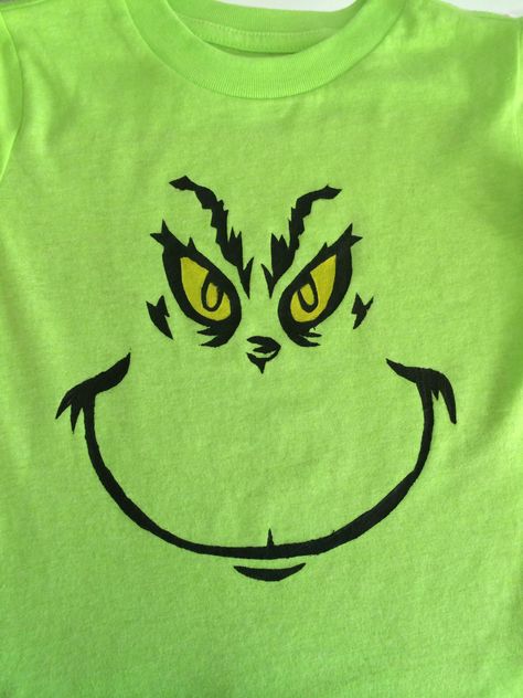 Gavin wanted a Grinch shirt for Dr. Seuss week. Made a stencil with Reynolds freezer paper and painted the face on! Grinch Dressup Ideas, Diy Grinch Shirts For Kids, Diy Grinch Shirt, Seuss Costumes, Dr Seuss Costumes, Dr Seuss Shirts, Diy Christmas Shirts, Grinch Shirt, Grinch Christmas Party