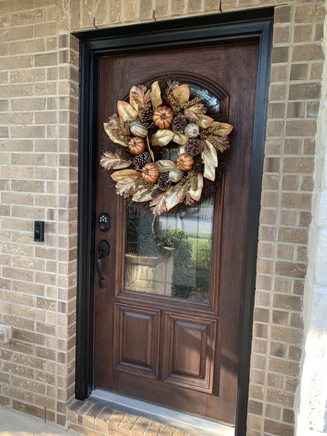 Updated front door - re-stained dark brown and painted door frame Tricorn Black (SW) to match shutters! I❤️my door now 😊 Updated Front Door, Tricorn Black Front Door, Stained Front Door, Garage Door Lights, Painted Exterior Doors, Brown Front Doors, Mahogany Entry Doors, Black Front Door, Tricorn Black