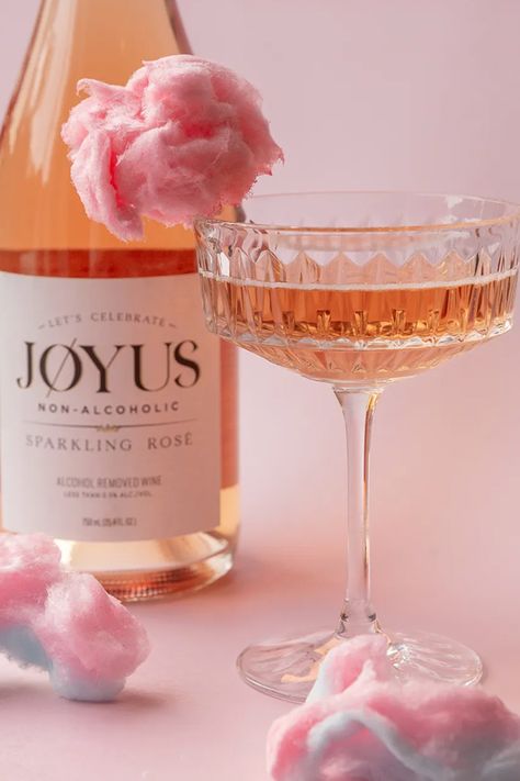 Look no further because we have the most delightful drink to sweeten those summer vibes. Introducing the Non-Alcoholic Cotton Candy Spritz. An oh-so-adorable non-alcoholic cocktail that will make you feel like you're sipping jøy straight from a unicorn's mane. Get ready to unleash your inner child with every sip. Rose Alcohol, Cotton Candy Drinks, Cotton Candy Cocktail, Summer Mocktail, Cloud Decor, Spritz Cocktail, Candy Cocktails, Cotton Candy Flavoring, Non Alcoholic Wine