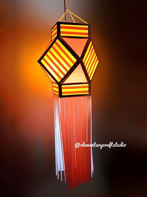 Handcrafted Diwali Traditional Kandils "Dual Colour Stripe Kandil" Size: 15" kandil and 20" Tails. Colours: Orange, Mango with Golden. Materials Used: Card-Board, Fluorescent Paper, Golden Emboss Paper, White Glue and Adhesive Paper tape. Note: 1. No Bamboo Sticks used. 2. Not Foldable. 3. We only accept local orders within 15kms Radius from Chembur. Kandils are individually packed in Poly Bag. Delivery charges extra as per actuals Vesak Lantern, Diwali Kandil, Diwali Wishing, Akash Kandil, Diwali Lantern, Diwali Decorations At Home, Easy Diy Room Decor, Diwali Diy, Acrylic Painting Flowers