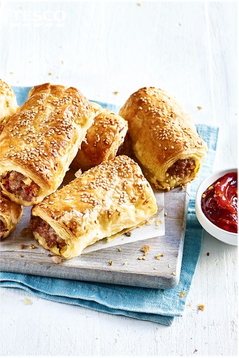 With its light, flaky pastry and mouthwateringly meaty filling, this sausage roll recipe will be right at home in your picnic basket. | Tesco Stork Recipes, Bonfire Night Food, Edd Kimber, Savoury Bakes, Sausage Rolls Recipe, Fennel Sausage, Sausage Roll, Sausage Bake, Tesco Real Food