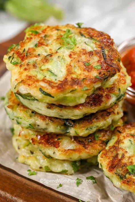 These zucchini panackes are one of my favorite snacks without all of the guilt! #spendwithpennies #zucchini #keto #snacks #zucchinipancakes #appetizer #easyappetizer #easyrecipe #easysnack Veggie Pancakes, Zucchini Fritters Recipe, Zucchini Pancakes, Fritters Recipe, Easy Zucchini, Zucchini Fritters, Fritter Recipes, Bread Appetizers, Zucchini Recipes