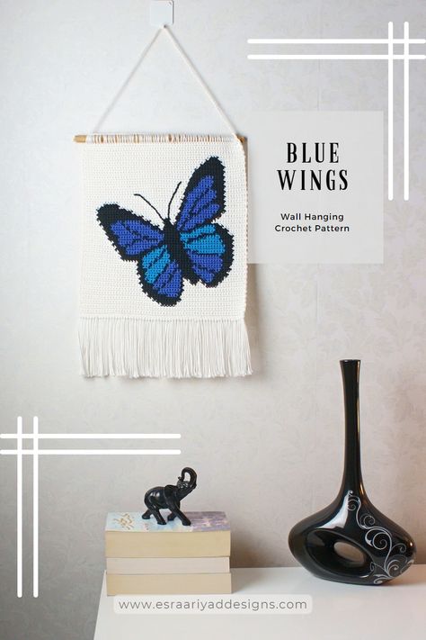 Looking for a unique and eye-catching crochet project to brighten up your living space? Introducing the Blue Wings Wall Hanging Crochet Pattern! Dive into the world of crochet color work with this versatile pattern that combines tapestry crochet and intarsia crochet techniques. Create your own stunning crochet home decor wall hanging with our easy-to-follow crochet free pattern. Check it Out! Crochet Wall Hanging Patterns, Crochet Graphic, Butterfly Wall Art Diy, Crochet Wall Hanging, Crochet Applique Patterns Free, Crochet Wall Art, Wall Hanging Designs, Crochet Eyes, Crochet Birds