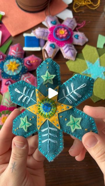 Brianna on Instagram: "Felt snowflake stitching! ❄️ The colors on this one plus the stars made the vibe a little “under the sea” but it’s still super cute.   . . . #modernembroidery #fiberart #embroideryart #handstitched #stitchersofinstagram #dmcembroidery #michiganartist #bordados #feltart #ornaments #christmas" Snowflake Felt Ornament, Felt Stars, Felt Ornaments Diy, Felt Projects, Felt Patterns, December 19, One Plus, Modern Embroidery, Star Ornament