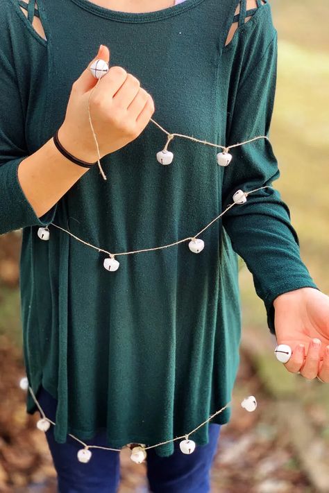 Jingle Bell Christmas Garland | Buy This Cook That Make Christmas Garland, Garland On Mantle, Bell Crafts, Jingle Bell Garland, Jingle Bell Crafts, Bell Garland, Best Christmas Recipes, Bell Christmas, Holiday Fragrance