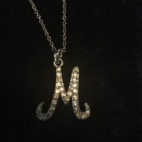 Sale 🎈Initial M Necklace Initial necklace with letter M on a silver tone chain. Necklace is silver tone and initial is silver with rhinestones. Worn once. Necklace is 16". Jewelry Necklaces Regina George Initial Necklace, M Initial Necklace Aesthetic, M Necklace Aesthetic, Initial M Necklace, M Letter Necklace, M Necklace Initial, M Initial Necklace, Letter M Necklace, Necklace With Letter