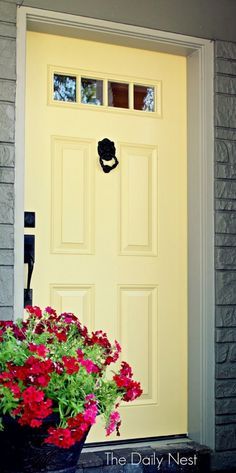 Pale yellow with a grey house... and black hardware again ~!~ Beautiful Front Door Paint Colors - Satori Design for Living Yellow Front Door, Front Door Paint, Exterior Door Colors, Yellow Front Doors, Beautiful Front Doors, Door Paint, Front Door Paint Colors, Yellow Door, Door Paint Colors