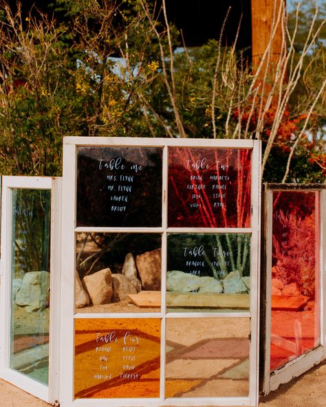 Turning repurposed, stained-glass windows into a seating chart is simple and yields gorgeous results. Wild Heart Events used only white marker to finish off this colorful iteration. Nontraditional Wedding Arch, Stained Glass Table Decor, Burnt Orange Wedding Ideas, Simple Seating Chart Wedding Ideas, Mosaic Wedding, Wedding Stationary Design, Light Backdrop, Wedding Ceremony Backdrop, Wedding Table Plan