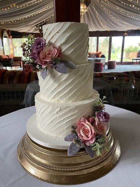 3 tier buttercream frosted wedding cake with unusual diagonal texture design , finished with clusters of artificial flowers and foliage Cake Designs 3 Tier, Frosted Wedding Cake, Buttercream Cake Designs, Quinceanera Cakes, 3 Tier Cake, Fresh Flower Cake, Buttercream Wedding Cake, Fall Wedding Cakes, Savannah Wedding