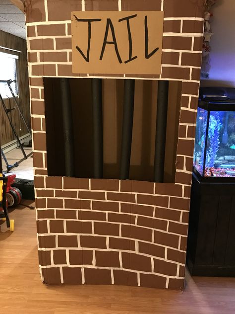 DIY cardboard box Jail Jail Props Diy, Cardboard Box Jail, Carnival Jail Booth, How To Make A Jail Cell Prop, Cardboard Jail Cell, Things To Build With Cardboard Boxes, Jail Booth Design, Diy Jail Cell Prop, Cardboard Props Diy