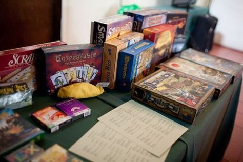 The Board Game Table Wedding Reception Games For Guests, Board Game Wedding, Wedding Reception Entertainment, Guest Entertainment, Gamer Wedding, Reception Games, Reception Gifts, Wedding Games For Guests, Reception Activities