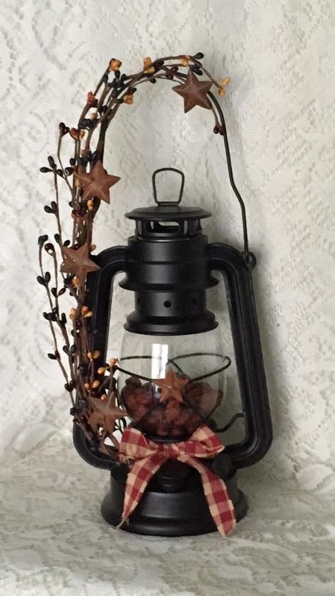 10" Black Oil Lantern.. $19.82  https://www.facebook.com/676492815814708/photos/pb.676492815814708.-2207520000.1438944144./679237398873583/?type=3&theater Oil Lantern Decor Ideas, Decorate Lanterns Ideas Metal, Lantern Christmas Decor Ideas, Farmhouse Christmas Lantern, Old Fashion Lanterns, Oil Lamp Decor, Oil Lamp Centerpiece, Large Table Top Primitive Lanterns With Light, Large Christmas Primative Table Candles