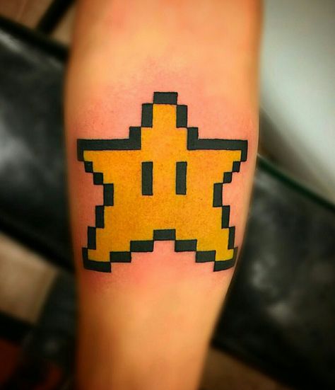 Original Super Mario Brothers star arm tattoo by Josh Montiel at Valkyries Tattoo Gainesville Fl inkbyjosh5@gmail.com Mario Star Tattoo, Super Mario Tattoo, Pixel Tattoo, Star Tattoo Meaning, Mario Tattoo, Mario Star, Scene Tattoo, Epic Tattoo, Star Tattoo Designs