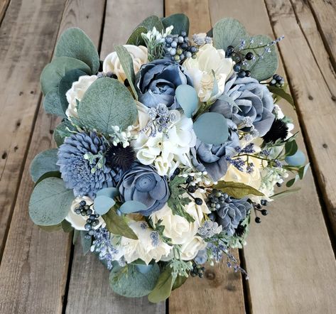 "💥ALL SALES ARE FINAL💥 Wood Flower Bouquet, Dusty Blue Bridal Bouquet, Slate Blue Wooden Flower Bouquet, Wedding Bouquets for Bride, Wedding Flowers for Bridesmaid Sola Wood Flowers are a perfect wedding flower alternative to fresh flowers.  Our wooden bridal flowers are 100% fake and will never wilt or die.  All greenery and fillers are completely artificial or dried, nothing is living.  Storing the wood flowers is very easy and allows brides to purchase early and plan ahead. 🖌flower colors Wooden Flower Bouquet, Slate Blue Wedding, Wood Flower Bouquet, Bridal Bouquet Blue, Dollar Eucalyptus, Blue Wedding Bouquet, Blue Wedding Flowers, Dusty Blue Weddings, Blue Bouquet