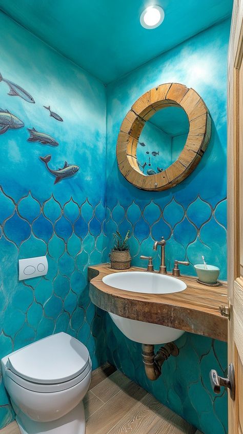 Dive into tranquility with a Pisces-inspired underwater sanctuary! 🌊✨ Fish scale tiles and a porthole mirror transport you to the ocean depths, while driftwood accents add a rustic touch. Let the calming blue ombre walls whisk you away to a serene, aquatic escape. 🐚🛁💙 Underwater Bathroom, Oasis Bathroom, Under The Sea Bathroom, Fish Scale Tiles, Ocean Bathroom, Porthole Mirror, Fish Scale Tile, Ombre Wall, Ocean Depth