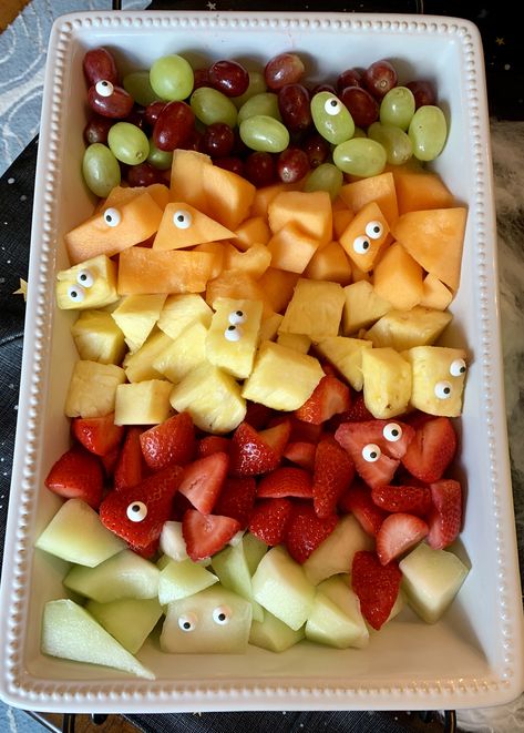 Spooky fruit tray Fruit Tray Halloween Ideas, Spooky Fruit Tray, Halloween Fruit Salad Ideas, Spooky Fruit Platter, Halloween Fruit Tray Ideas, Halloween Fruit Salad, Halloween Fruit Platter, Spooky Fruit, Halloween Fruit Tray