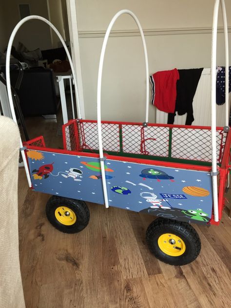 Diy Wagon Canopy, How To Make A Covered Wagon, Festival Wagon, How To Make A Covered Wagon Project, Wagon Hacks, Covered Wagon Project Kids, Baby Trend Wagon Hacks, Festival Trolley, Wagon Floats