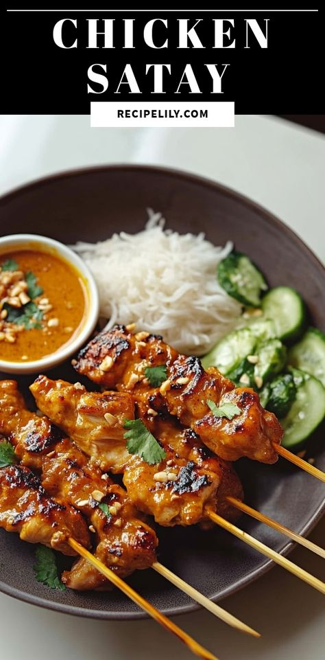 Savor the perfect blend of flavors with this delicious Chicken Satay recipe! This easy-to-follow guide will take you through marinating tender chicken in a rich, aromatic spice mix before grilling to perfection. Served with a creamy peanut dipping sauce, it's an irresistible dish that's perfect for entertaining or a cozy night in. Whether you're a novice cook or a seasoned chef, these skewers are sure to impress. Get ready to indulge in a taste of Southeast Asia with this mouthwatering Chicken Satay that will leave everyone asking for seconds! Discover the recipe now and elevate your dinner game! Tangy Chicken, Thai Chicken Satay, Chicken Satay Skewers, Chicken Satay Recipe, Satay Recipe, Peanut Dipping Sauces, Satay Sauce, Chicken Satay, Thai Chicken