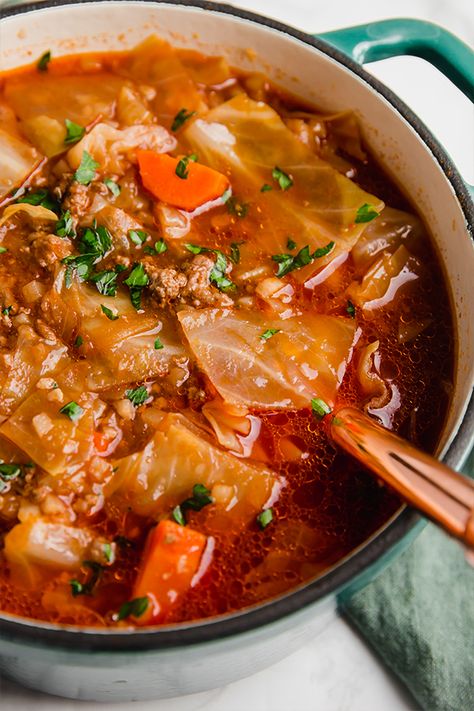 This cabbage roll soup is a rich, savory and nourishing one-pot meal. It's paleo, whole30, and can be made to be AIP. Soup Cabbage, Cooking With Ground Beef, Cabbage Roll Soup, Cabbage Roll, Ham And Beans, Slow Cooker Tacos, Ham And Bean Soup, Beef Bone Broth, Comfort Dishes