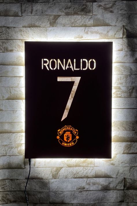 Cristiano Ronaldo wall decor will brighten your living room. You can use it as a night light. Manchester United Wall Art for Football Fan Gift. 👉 A workshop where your dream designs are produced; https://www.etsy.com/shop/MeerkatWoodDesign?ref=seller-platform-mcnav ✔️ Wooden led signs will act as a night light in your room thanks to the light they emit. ✔️ These wonderful wooden decors; Perfect for the living room, game room, office, kids room, garage and any entertainment area! ✔ Manchester United Gifts, Football Room Decor, Football Wall Decor, Football Rooms, Laser Cut Lamps, Living Room Game Room, Travis Scott Wallpapers, Art Football, Clever Captions For Instagram