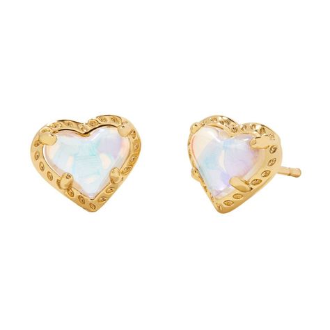 We don't know if it's just their heart shape, but we're crushing on the Anna Stud Earrings. Adorably chic, these studs are a fun and flirty take on your everyday earrings. Style as a standalone pair or wear with a bold statement earring for an always-sweet look. Designer, founder, and philanthropist Kendra Scott started her company in 2002, just three months after her first son was born. Her commitment to innovation, quality, customer service, and detail has taken her from a small startup to a billion-dollar brand. Kendra Scott is known for its design and material innovation, use of color, and signature shapes. As the lifestyle brand continues to grow, Kendra and her namesake company remain true to its founding philosophy of Family, Fashion, and Philanthropy for both customers and employee Preppy Inspiration, Dichroic Glass Earrings, Jewelry Girl, Nose Piercings, Preppy Jewelry, Target Gifts, Letter Earrings, Kendra Scott Necklace, Kendra Scott Earrings