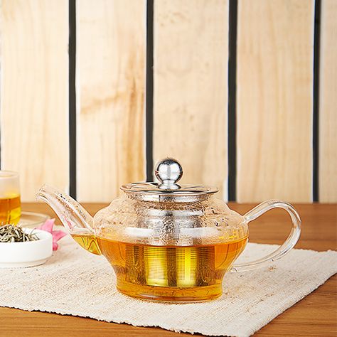 This teapot is perfect for steeping a clear pot of tea for two, and makes for a charming table-top accessory for home and office both. Glass Tea Set, Best Herbal Tea, Sun Tea, Tea Warmer, Glass Filter, Glass Teapot, Herbal Teas, Style Japonais, Heat Resistant Glass