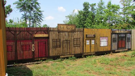 Privacy Fence with old west town scene Western Town Privacy Fence, Old West Town Privacy Fence, Western Fence Ideas, Rustic Privacy Fence, Old West Decor, Old Western Towns, Old West Town, West Town, Western Town