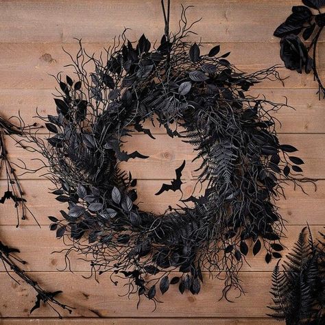 This black Halloween wreath project from Hobbycraft looks very natural, but it’s made using artificial foliage. That means it can be stored away after Halloween and reused next year too!You could make this wreath using dried flowers for a more sustainable option. Halloween Knitting Patterns, Black Halloween Wreath, Halloween Witch Wreath, Halloween Door Wreaths, Spooky Wreath, Halloween House Decoration, Fairy Lights Decor, Black Wreath, Halloween Printables Free