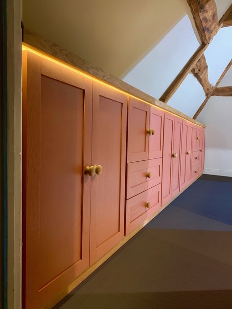 Clothes Cupboards in the Eaves of a Converted Barn Built In Desk Under Eaves, Storage In Eaves, Built In Cabinets Sloped Ceiling, Attic Eaves Storage, Storage Under Eaves, Attic Cupboards Sloped Ceiling, Eaves Cupboards, Under Eaves Wardrobe, Loft Cupboards