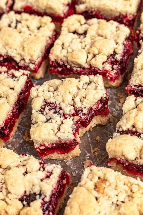 Cranberry Bars are buttery brown sugar cake bars with fresh cranberry filling. A Christmas treat that you can easily make all year round. Cranberry Bars Recipe, Cranberry Recipes Dessert, Raspberry Crumble Bars, Lemon Cream Cheese Bars, Streusel Bars, Cranberry Bars, Cheese Bars, Raspberry Crumble, Cream Cheese Bars