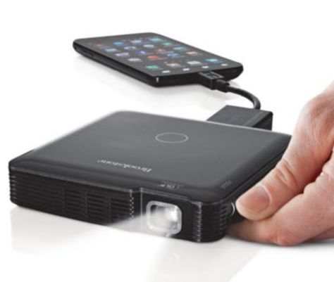 Tech - Pocket Projector | The Gentleman's Journal | The latest in style and grooming, food and drink, business, lifestyle, culture, sports, restaurants, nightlife, travel and power. Drink Business, Pico Projector, Projector Tv, Smartphone Gadget, Hissy Fit, Cool Electronics, Business Lifestyle, Smartphone Holder, Energy Technology