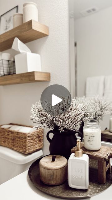 Nina Humes on Instagram: "flashback friday ✨🤍🌿  to this shelf decor in my guest bathroom. Decorated this space with so many budget friendly finds too!  details: + black vase, toilet paper holder, brass tray: Walmart + shelves, black wire basket, canisters, shower curtain: Target + curtain rod, rings, wood pedestal, tissue box cover, soap dispenser: Amazon  Everything here is linked in my bio and LTK! 🤍  Follow my shop @diariesofmyhome on the @shop.LTK app to shop this post and get my exclusive app-only content!  #liketkit #LTKhome  @shop.ltk https://liketk.it/4q74a . . . . . #homedecor #flashbackfriday #bathroomdecor #bathroomdetails #bathroomstyling #guestbathroom #guestroomdecor #affordablehomedecor #budgetfriendlydecor #boujieonabudget #bathroomstyling #halfbath #powderroom #smallbat Walmart Shelves, Target Curtains, Bathroom Tray Decor, Wood Canisters, Black Wire Basket, Bathroom Tissue Holder, Shaker Village, Eclectic Wallpaper, Boho Farmhouse Decor