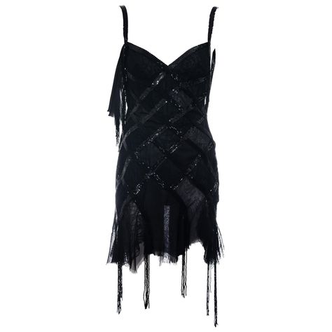 ▪ Gianni Versace black silk and lace mini dress ▪ Beaded and sequin criss-cross strands ▪ Low back ▪ Handkerchief hemline ▪ Hanging bead tassels ▪ IT 42 - FR 38 - UK 10 - US 6 ▪ c. 2003