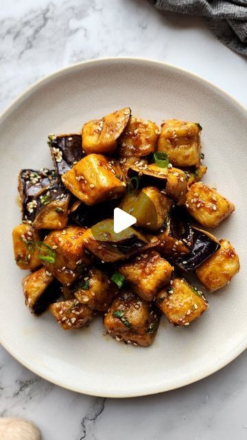 Dan Dumbrell on Instagram: "Soy Garlic Crispy Eggplant recipe 🍆 extra crunchy for your pleasure 😉 

I was absolutely craving some fast food after the weekend shenanigans (💃🏽) but didn't want anything too heavy so compromised and made this crispy fried eggplant in a sweet sticky soy garlic sauce. If you've never tried deep fried eggplant you are missing out - when done right it is super crispy on the outside but deliciously soft and buttery on the inside. The trick I've found is to a) salt the eggplant heavily beforehand to draw out moisture and add more flavour b) use a combo of flour/cornstarch/potato starch to make sure the dry batter sticks properly and c) making sure you fry this at high heat! ANYWAY give this a bash the next time you get your hands on some 🍆 

Recipe 👇 

Ingredi Soy Garlic Sauce, Onion Greens, Crispy Eggplant, Fried Eggplant, Eggplant Recipe, Baked Vegetables, Slotted Spoon, Potato Starch, Deep Fry