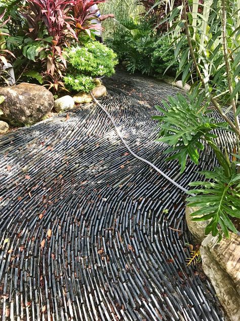 Love the use of slate tiles laid sideways in this drainage swale to look like water.   Photo by Jimmy Turner. Garden Slate Ideas, Forest Patio, Garden Props, Slate Garden, Slate Tiles, Paving Ideas, Step Stones, Water Photo, Pond Water Features