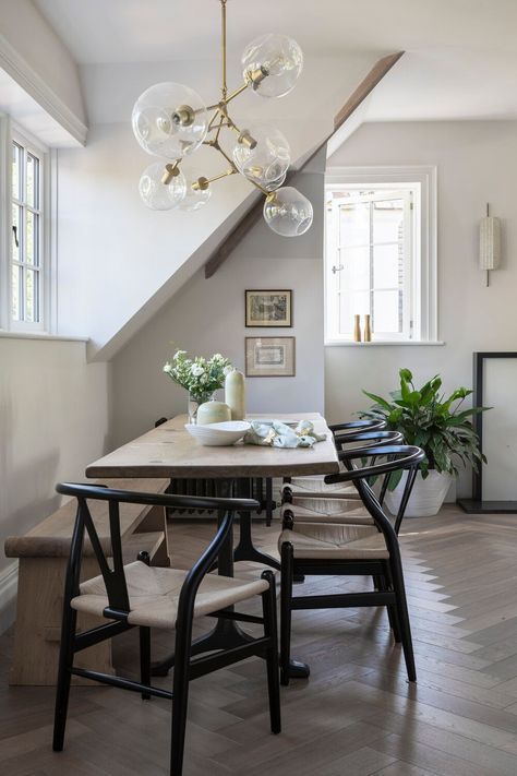 Dining table, 4 black rattan dining chairs and wooden bench in this apartment interiors. This gorgeous chandelier with 7 glass bolles and gold structure. And lets not forget this gorgeous chevron floor. #interiordesign #diningroom #formaldining Black Wood Chairs, Wishbone Chair Dining, Decor And Organization Ideas, Scandinavian Kitchens, Wooden Dining Table Designs, Scandinavian Kitchen Design, Wood Chairs, Wooden Dining Table, Rattan Dining Chairs