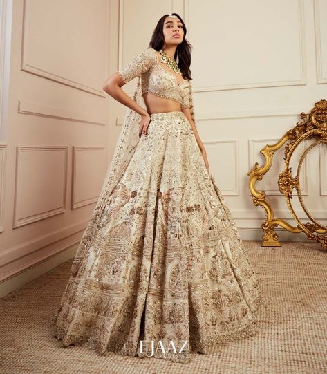 White And Gold Bridal Lehenga, Ivory Lehenga Bridesmaid, Alchemy Wedding, Gold Wedding Lehenga, Desi Shopping, Gold Lehenga Bridal, Ejaaz Couture, Ivory And Gold Wedding, Ivory Lehenga