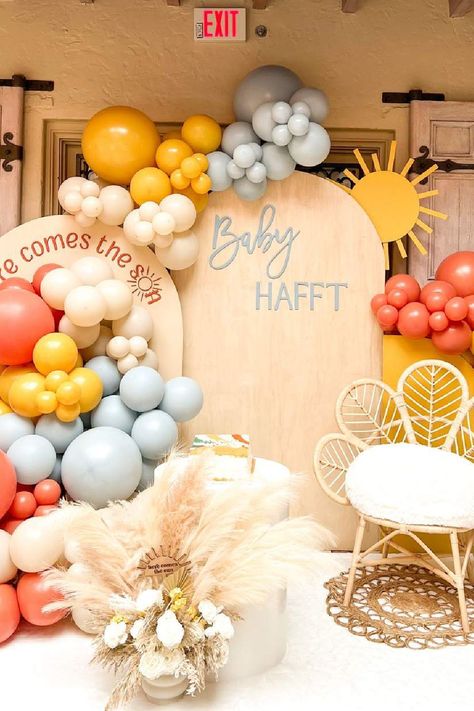 Take a look at this bright and sunny baby shower! What gorgeous party decorations!! See more party ideas and share yours at CatchMyParty.com Sun Theme Balloon Arch, Here Comes The Sun Photo Backdrop, Here Comes The Sun Centerpiece Ideas, Bright Baby Shower Ideas, Sunshine Theme Baby Shower Ideas, Sun Themed Baby Shower Ideas, Cute Baby Shower Themes, Hippie Baby Shower, Sunshine Decorations