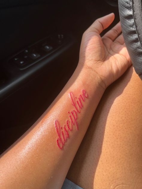 Red Tattoo Designs For Women, Red Ink Lettering Tattoo, Red Tattoos For Men, Red Ink Wrist Tattoo, Healed Red Ink Tattoo, Red Font Tattoo, Red Tattoos Aesthetic, Red Inner Arm Tattoo, 1 Of 1 Tattoo Red Ink