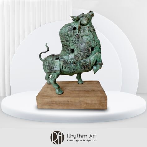 This strong Bull sculpture depicts muscularity. Features of the bull are detailed as it is well sculpted using beautifully carved pieces of metal. This notable bull details the high arch on the back, legs, sharp head, and curved tail. This strong tabletop bull sculpture is an embellished art piece for any space. Message us for more information! WhatsApp: +91 9819187697 - Bhavya Gala Email: bhavya@rhythmartgallery.com Bull Pictures, Rhythm Art, Bull Sculpture, Beautiful Sculptures, Antique Wood, The Bull, How To Antique Wood, Metal Sculpture, Arch