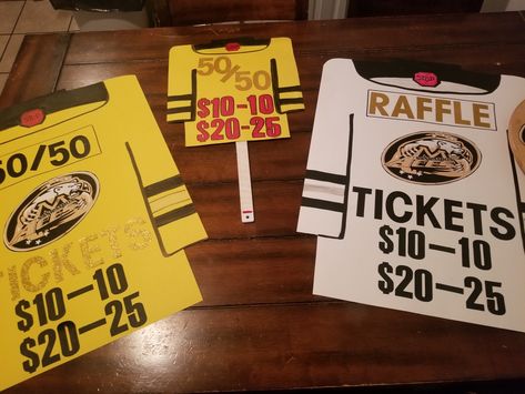 Raffle table sign, 50/50 sign and a smaller version for seller. Hockey Jersey Signs made out of poster board. All materials from Dollar store. Hockey Raffle Basket, Raffle Table Ideas, Hockey Tournament Decorations, Hockey Raffle Basket Ideas, Raffle Sign Ideas, Hockey Fundraising Ideas, Hockey Tournament Ideas, Softball Signs, Hockey Fundraiser