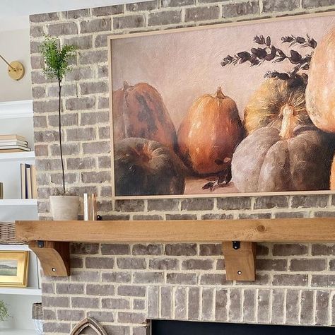 Jennifer on Instagram: "Happy Friday!! No one will probably see this since it’s not a reel but I don’t care. I love this Frame TV art I got off Etsy 🍁 #fireplacedecor #falldecor #frametv #frametvart #builtins #cozyliving #brickfireplace #homesweethome #cozyhome #traditionalhome" Fireplace With Frame Tv, Brick Fireplace, Frame Tv Art, Fireplace Decor, Tv Art, Frame Tv, Framed Tv, Cozy Living, Built Ins