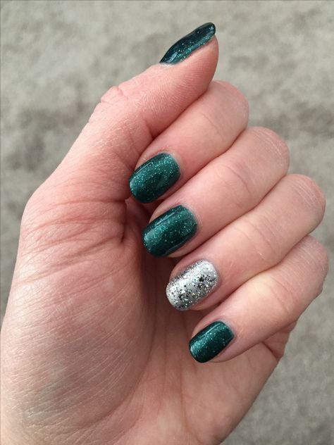 Simple green and silver sparkle manicure Green And Silver Christmas Nails, Green And Silver Nail Designs, Green Silver Nails, Green And Silver Nails, Sparkle Manicure, Silver Sparkle Nails, Snow Nails, Silver Nail Designs, Dark Green Nails