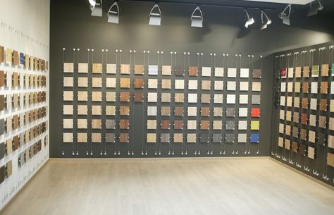 This showroom wall display was installed utilizing Albion's cable display system. http://signdesignsystems.com Flooring Showroom, Custom Office, Office Signs, Wall Display, Sign Design, Showroom, Cable, Signs, Wall