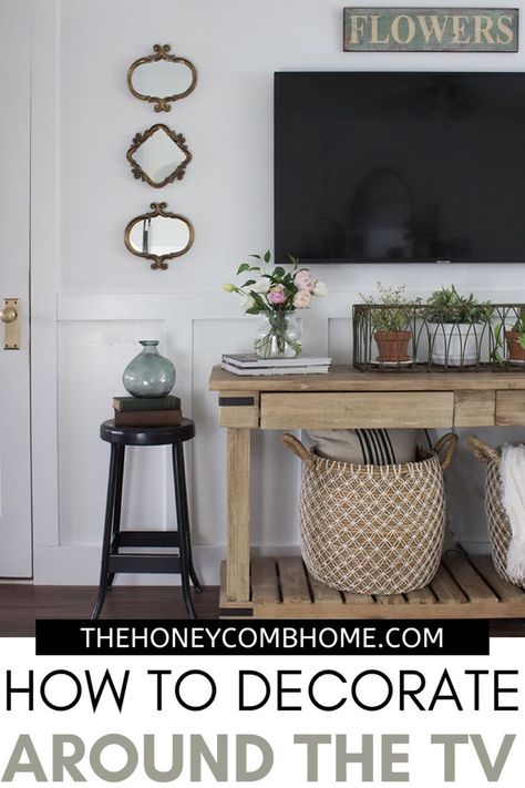 Simple decorating ideas to minimize the TV.  #livingroom #decoratingideas Style A Kitchen Island, Console Table Under Tv, Under Tv Decor, Decor Under Tv, How To Decorate A Console Table, Style A Kitchen, Tv Console Decorating, Decorating Around A Tv, How To Decorate Around A Tv