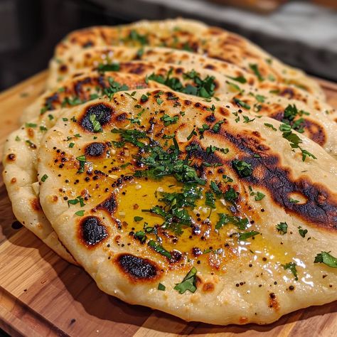 🍞 Elevate your meal with Homemade Garlic Butter Naan! Easy and delicious! 🍴 Garlic Butter Naan 🛒 Ingredients: All-purpose flour: 500g Yeast: 1 tsp Sugar: 1 tbsp Warm water: 300 ml Salt: 1 tsp Garlic: 3 cloves, minced Butter: 50g 👩‍🍳 Instructions: Dough: Mix flour, yeast, sugar, salt, and warm water. Knead until smooth. Let Rise: Let the dough rise for 1 hour. Cook: Roll out naans, fry in a pan with garlic butter. Serve: Warm and buttery, perfect with any meal! 🍞 Fresh, fluffy naan right f... Butter Naan, Homemade Garlic Butter, Instagram Recipes, Twisted Recipes, Trending Recipes, Garlic Butter, Naan, Tasty Dishes, Purpose Flour