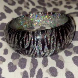 y2k glitter zebra vintage bangle bracelet | y2k jewelry | mcbling vintage trashy y2k zebra bangle bracelet | vintage Trashy Y2k Jewelry, Mcbling Bracelet, Y2k Bangles, Y2k Glitter, Bracelet Y2k, Vintage Bangle Bracelets, Y2k Jewelry, Tiktok Shop, Vintage Bangles